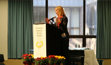 Keynoter-Elisabeth Leamy-Delivers informative speech before a breakout session