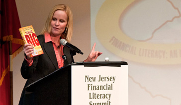 Keynoter-Elisabeth Leamy-Asks What is Financial Literacy-In Motivational Speech