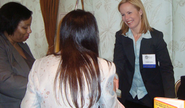 Media Relations Coach-PR Consultant-Elisabeth Leamy-Greets Readers at a Conference