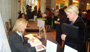 Author-Elisabeth Leamy-Signs Save BIG for Fan At the Northern Virginia Women’s Center Conference